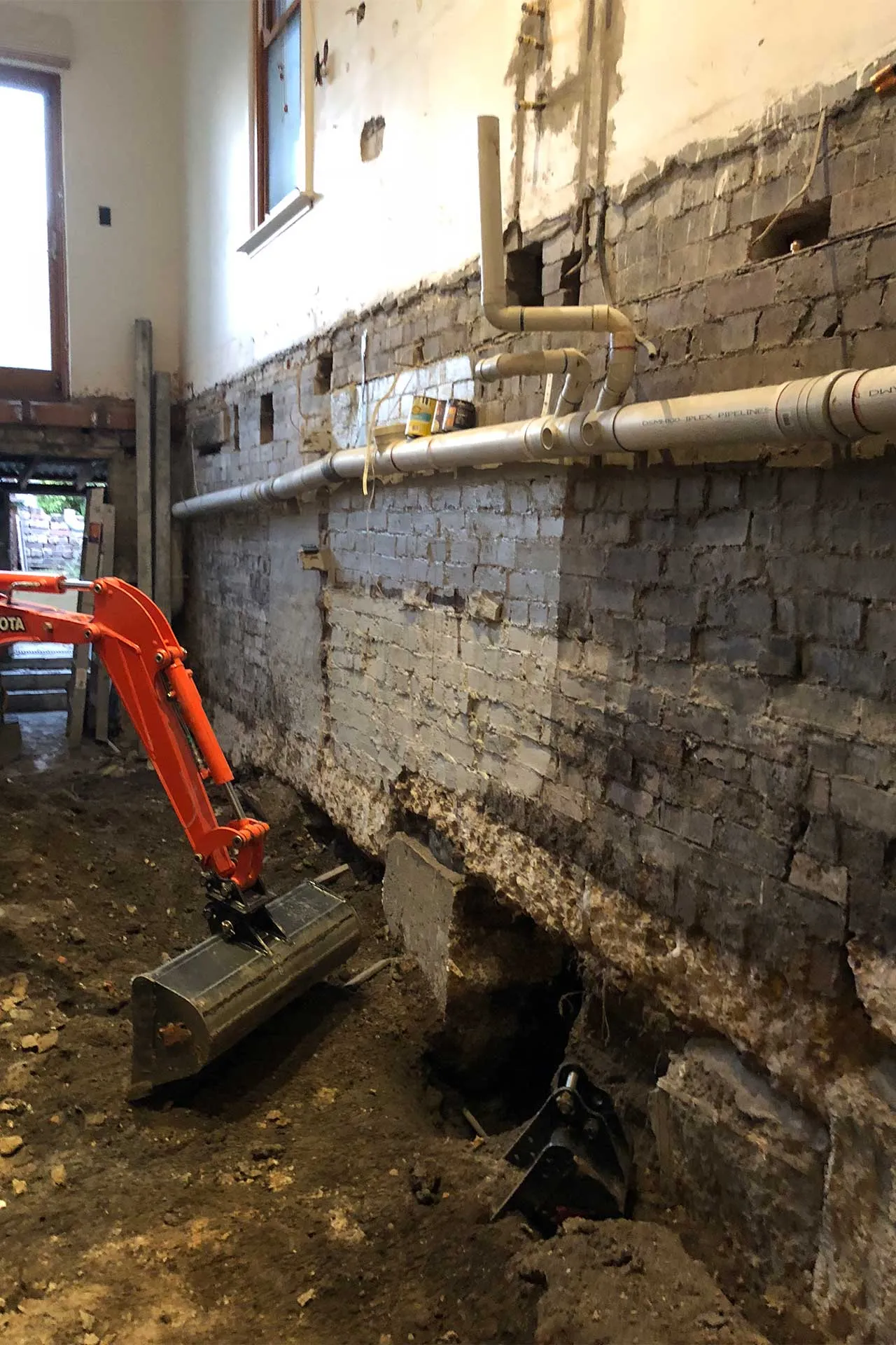 Navigating Building Height Constraints: Utilizing Basement Development – photo 1