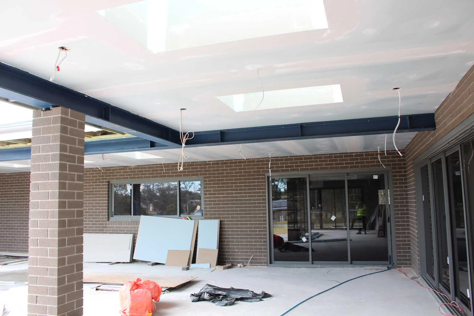 Steel beam system solution to provide structural support for the roof